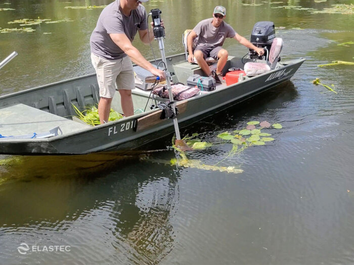 Pond weed cutter in water